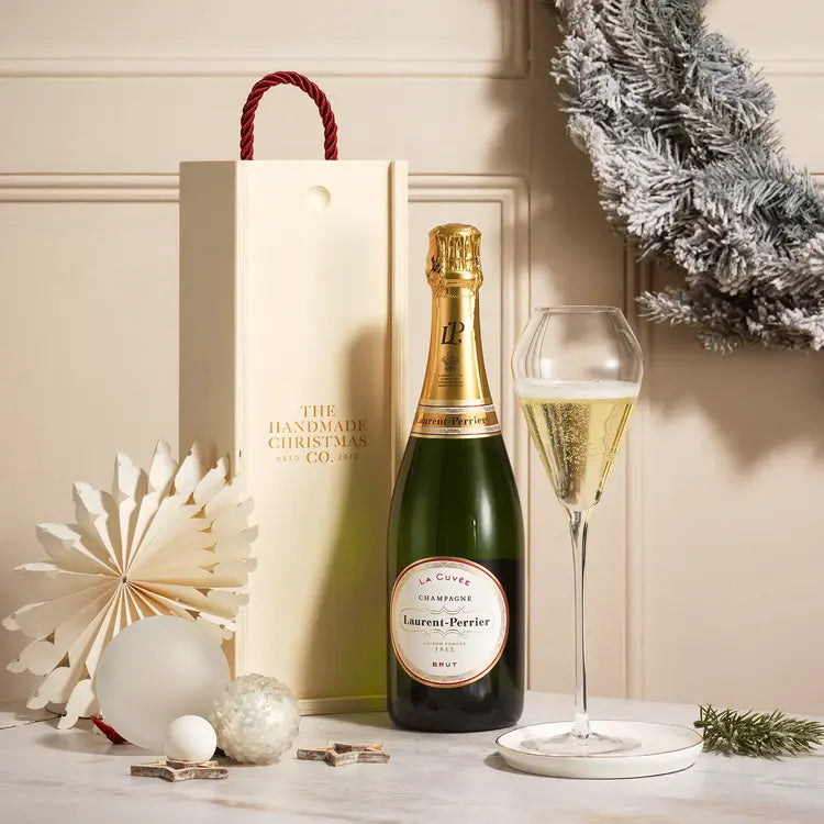 Festive corporate gift set featuring champagne and gift packaging